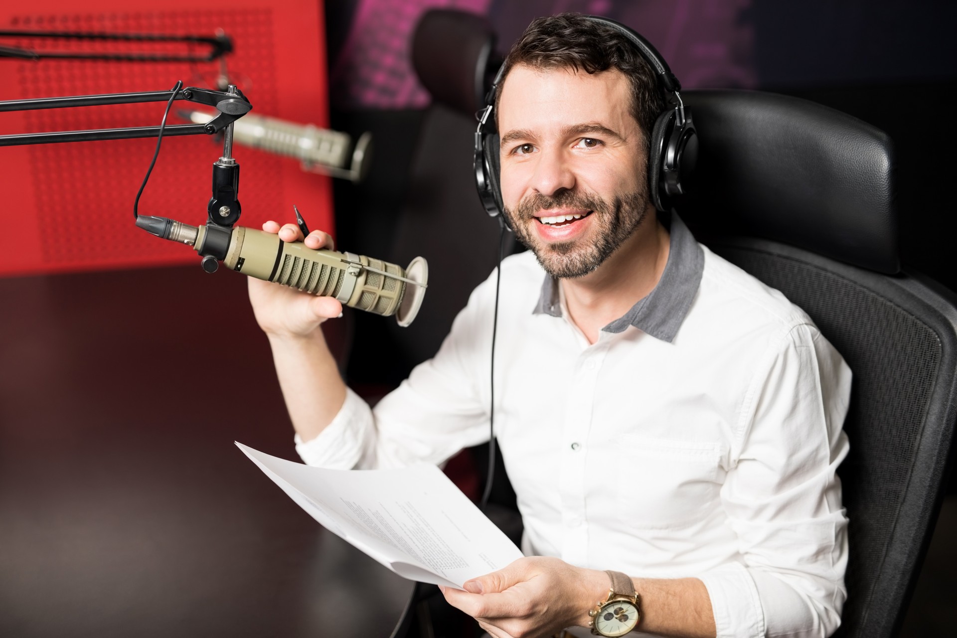 Radio host moderating at on air talk show